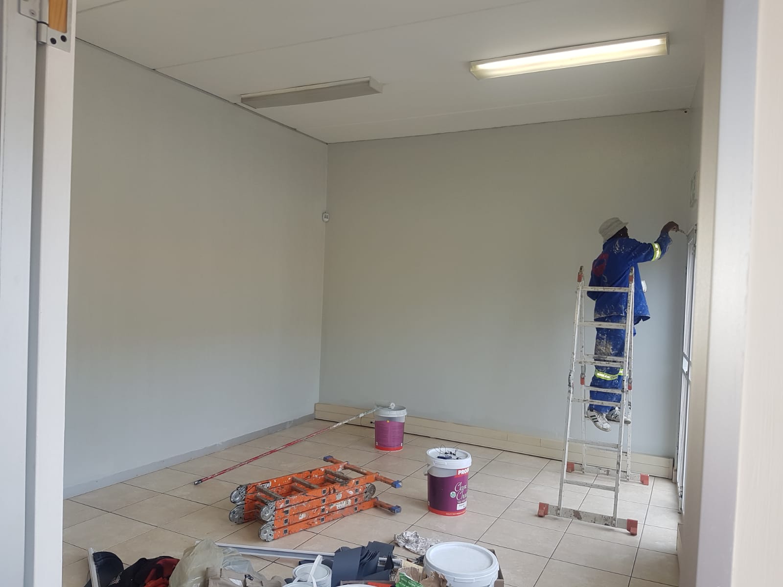 Painting and wall finishing in a bright room